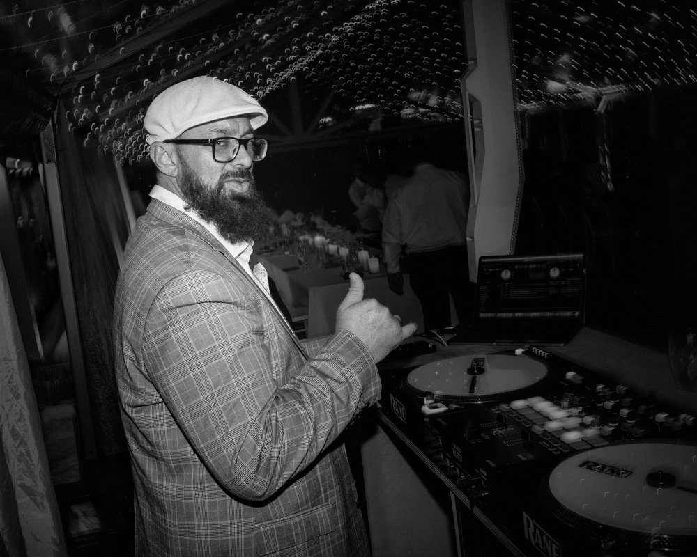 Adam Warbrick DJing at an event