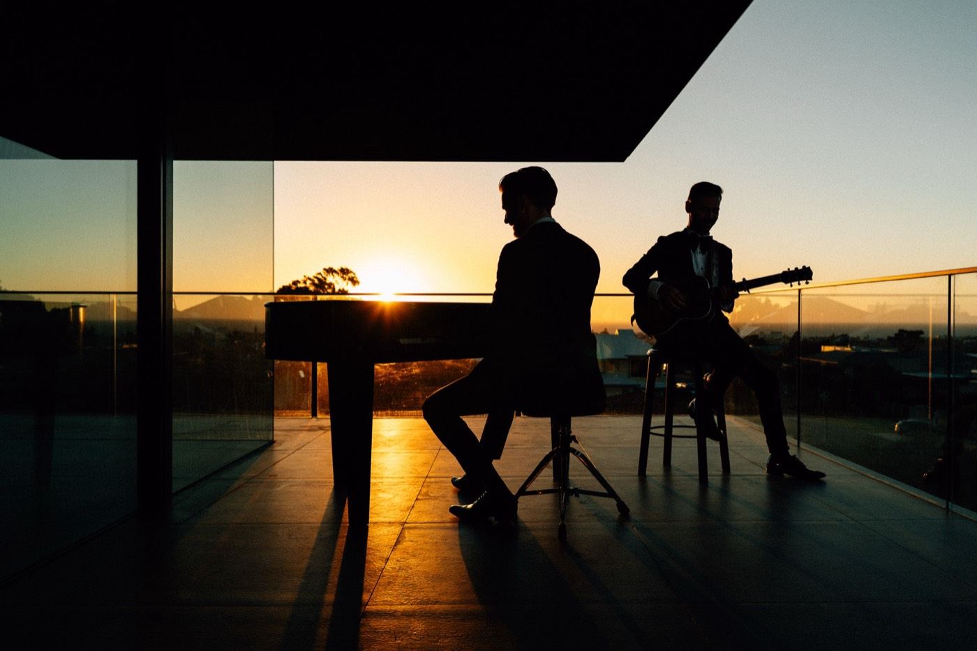 Curtis playing a rooftop set at dusk