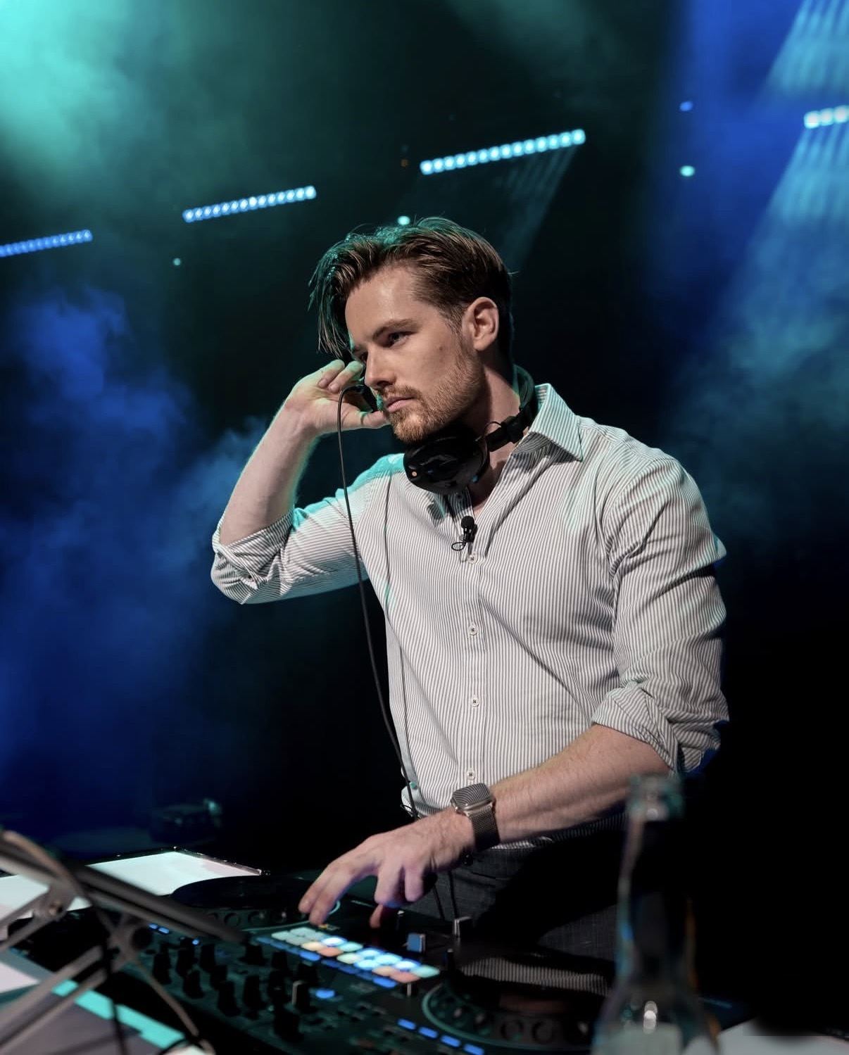 Curtis on stage with headphones