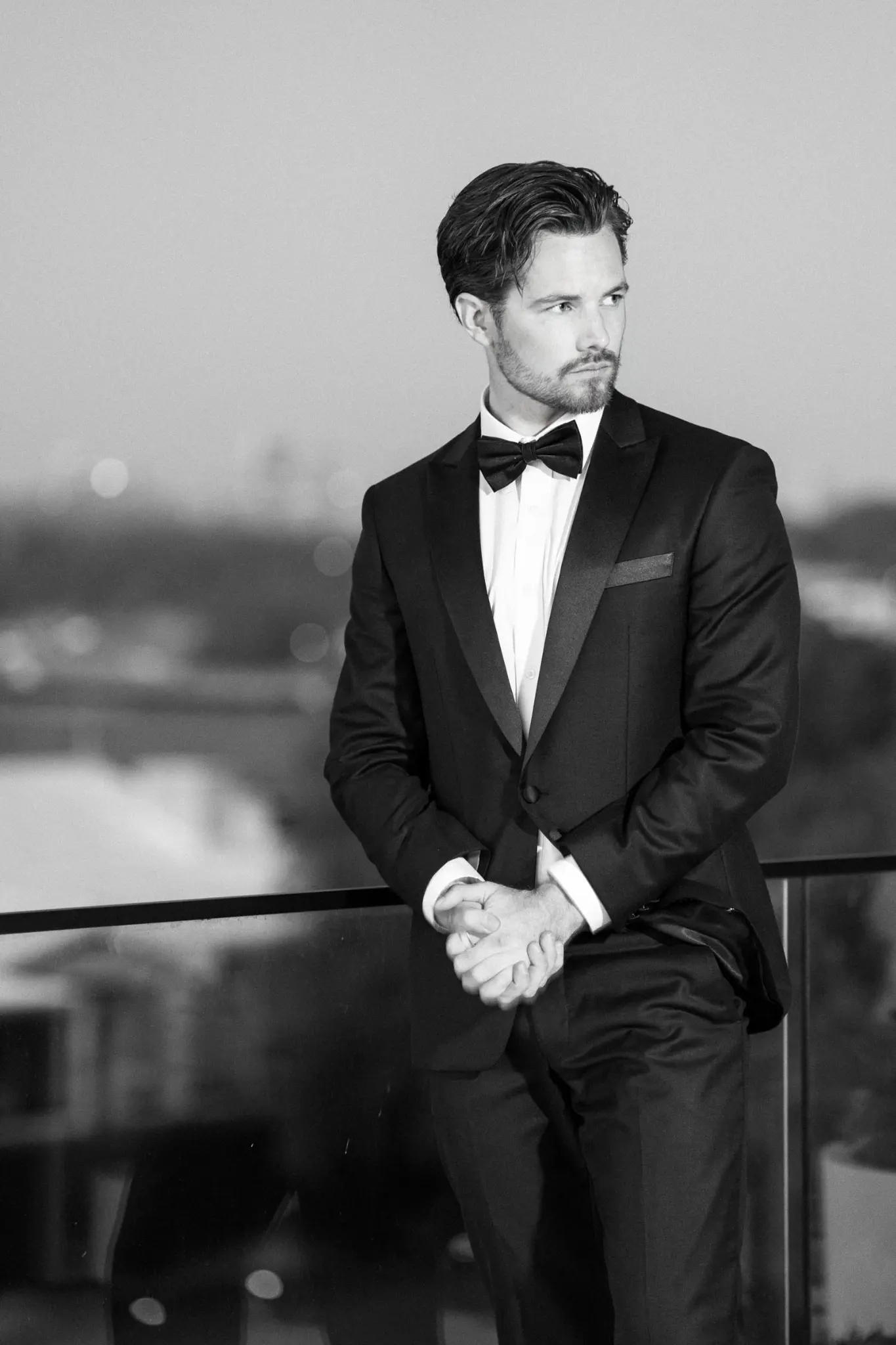 Curtis — ENVY Headliner DJ Host, black tie portrait