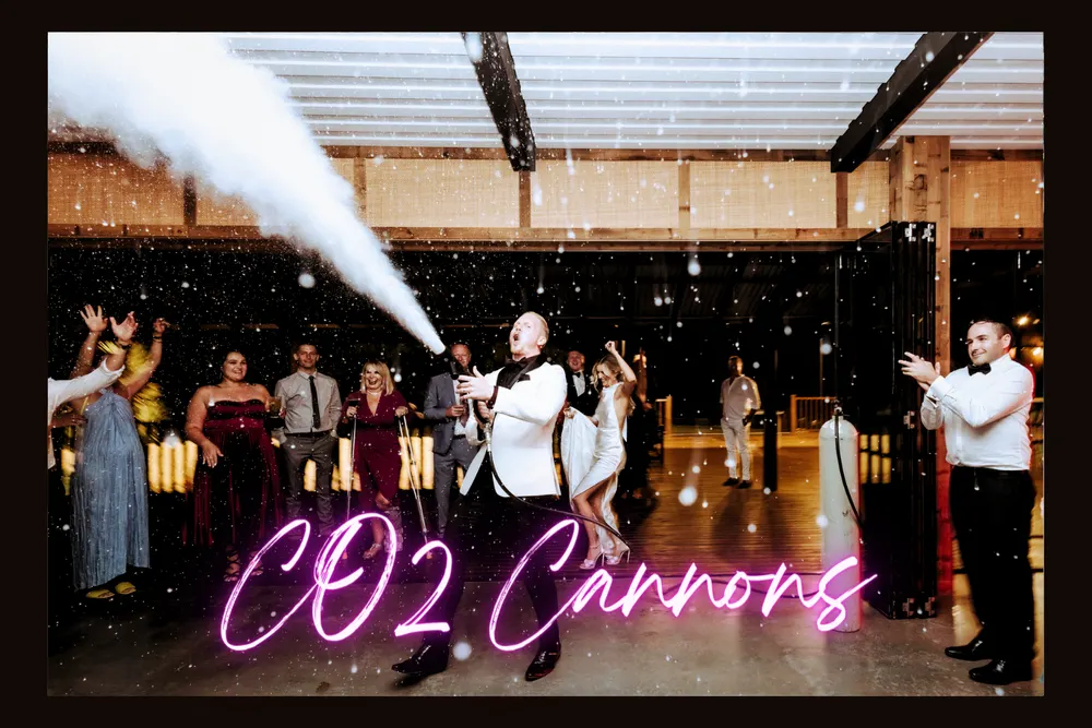 CO2 cannon firing over the dance floor while guests celebrate