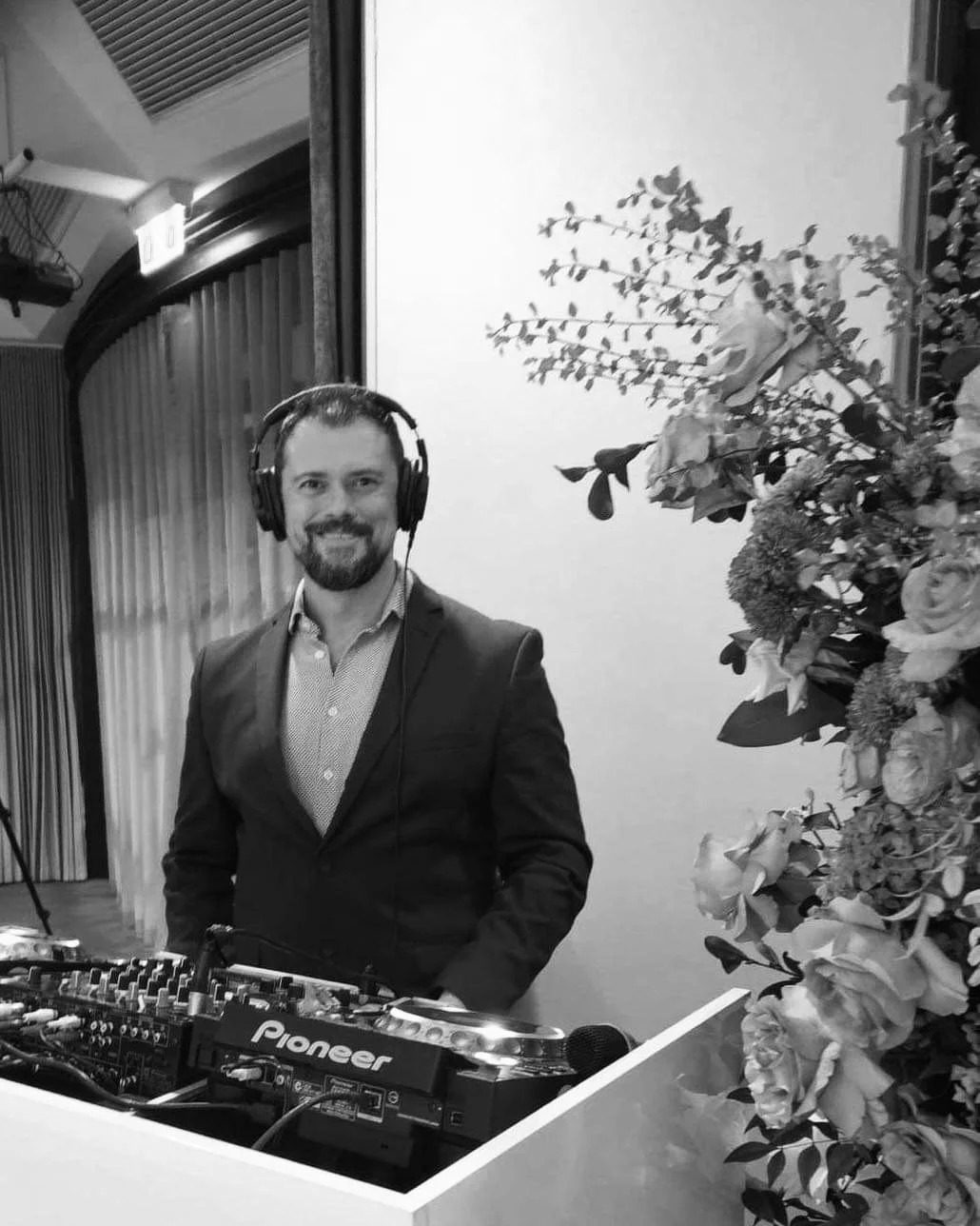 Max - ENVY Boutique DJ Host, behind the decks